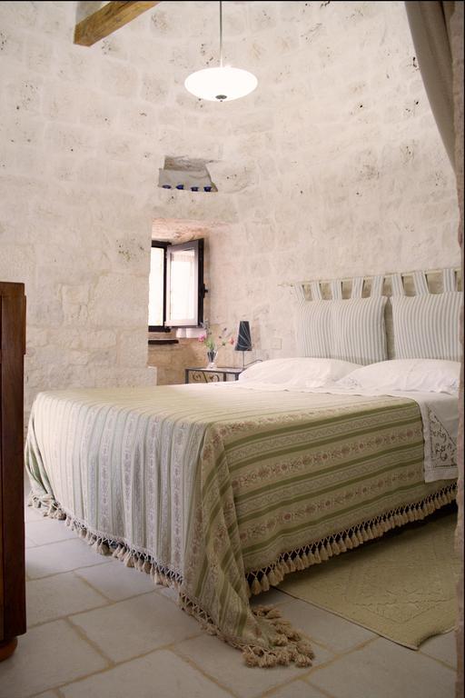 Апартаменты Trulli Sarmenzanello Ночи Номер фото